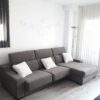 sofa gris chaiselongue reposacabezas abatibles